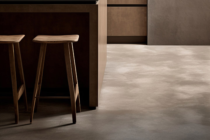 Subtle concrete effect LVT flooring pattern to enlarge the room and create more sense of kitchen space